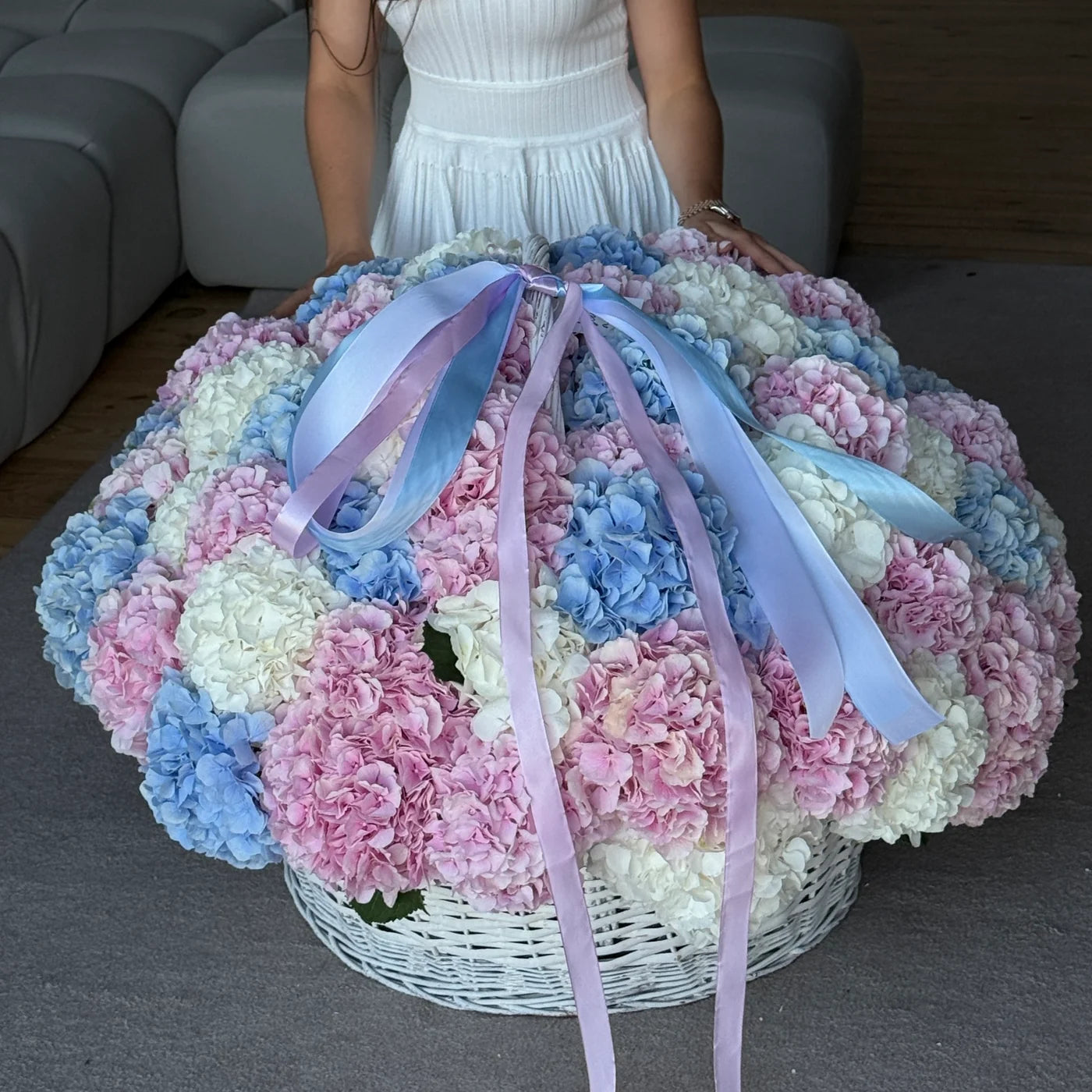 Basket of pink, blue and white hydrangeas Miami Bloom Flower