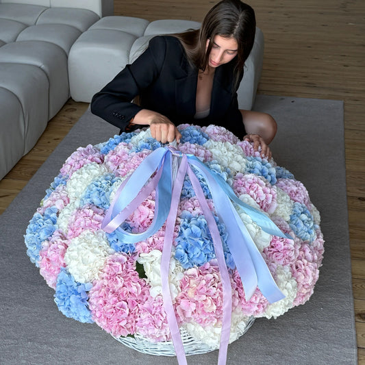Basket of pink, blue and white hydrangeas Miami Bloom Flower