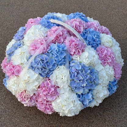 Basket of pink, blue and white hydrangeas Miami Bloom Flower